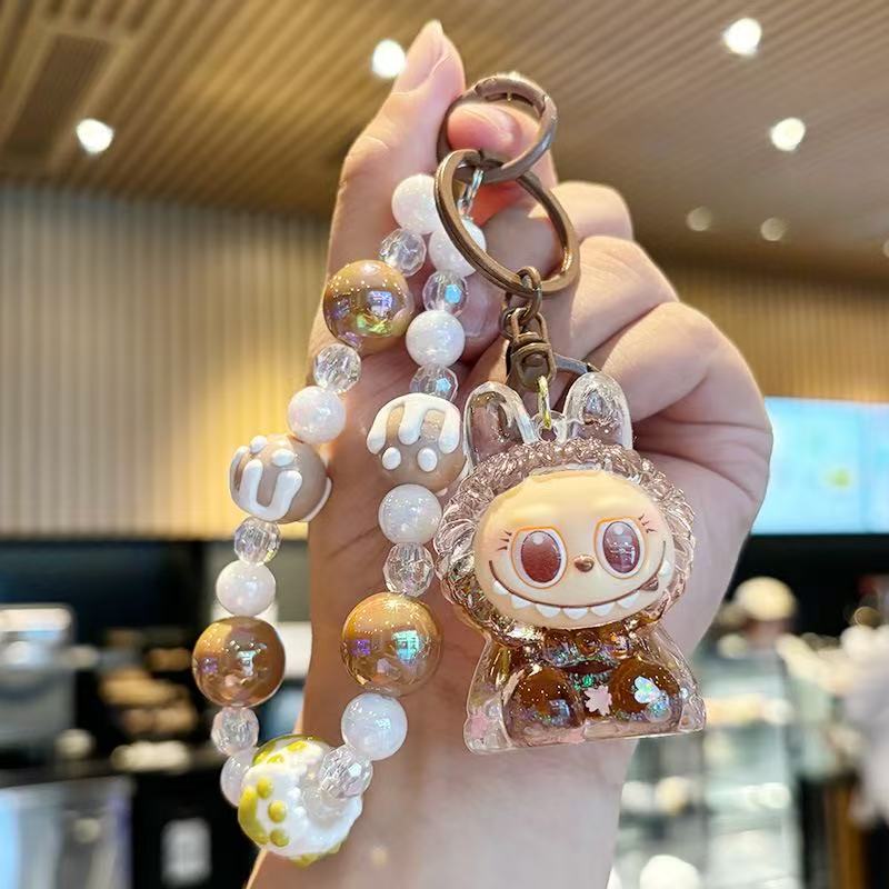 Crystal in oil, flowing sand bottle, canvas keychain