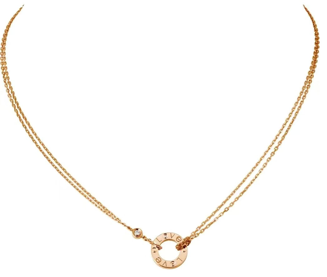 Cartier single diamond round pendant necklace
